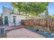Private backyard with a cozy patio, perfect for outdoor dining and relaxation at 1612 N High St, Denver, CO 80218