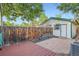 Backyard featuring patio and garage with a fenced perimeter offering privacy and security at 1612 N High St, Denver, CO 80218