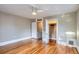 Light-filled bedroom with beautiful hardwood floors and a closet at 1612 N High St, Denver, CO 80218