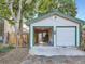 Detached two car garage with open door at 1612 N High St, Denver, CO 80218