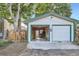 Spacious two-car garage with ample storage space, offering convenience and functionality for vehicle parking and projects at 1612 N High St, Denver, CO 80218