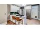 Contemporary kitchen featuring stainless steel appliances, ample counter space, and modern cabinetry at 1612 N High St, Denver, CO 80218