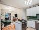 Bright, open-concept layout showcasing the living room, kitchen, and dining area, great for entertaining and everyday living at 1612 N High St, Denver, CO 80218