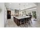 Gourmet kitchen with granite counters, stainless steel appliances, and pendant lighting at 17490 W 67Th Ave, Arvada, CO 80007