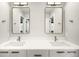 Bright bathroom features a double vanity with modern fixtures and ample counter space at 1462 S Vine St, Denver, CO 80210