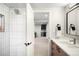 Beautiful bathroom with tiled shower and view into the bar area at 1462 S Vine St, Denver, CO 80210