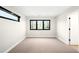 A bright and airy bedroom features contemporary design elements and neutral decor at 1462 S Vine St, Denver, CO 80210