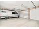 Spacious garage featuring ample room for vehicle storage and overhead doors, perfect for car enthusiasts or extra storage at 1462 S Vine St, Denver, CO 80210