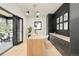 Modern home office with custom built-ins, sleek lighting, and outdoor access, perfect for a productive workspace at 1462 S Vine St, Denver, CO 80210