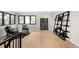 Spacious living room with hardwood floors, modern furniture, and a stylish black decorative ladder at 1462 S Vine St, Denver, CO 80210