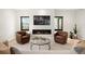 Cozy living room featuring modern fireplace, comfortable seating, and stylish decor at 1462 S Vine St, Denver, CO 80210