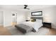 Bright main bedroom with carpet rug, side tables, a window, and closet access at 1462 S Vine St, Denver, CO 80210