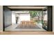 Outdoor dining area visible through bi-fold doors, seamlessly connecting indoor and outdoor spaces at 1462 S Vine St, Denver, CO 80210