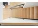 Modern staircase with light wood steps, sleek railing, and minimalist design at 1462 S Vine St, Denver, CO 80210
