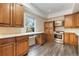 Beautiful kitchen boasting stainless steel appliances, custom wood cabinets, and ample counter space at 7963 S Valleyhead Way, Aurora, CO 80016
