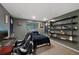 Spacious carpeted bedroom with decor, recessed lighting, and shelving with a window at 20460 Oakbrook Ln, Parker, CO 80138