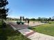 Community playground featuring swings, slides, and picnic area, ideal for Gathering fun at 20460 Oakbrook Ln, Parker, CO 80138