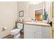 Bathroom with light colored walls, and white vanity at 5090 S Perry Park, Sedalia, CO 80135