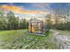 Exterior view of greenhouse on a beautiful piece of property at 5090 S Perry Park, Sedalia, CO 80135