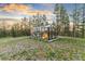 Scenic greenhouse featuring glass walls and roof, providing a cozy retreat with serene views at 5090 S Perry Park, Sedalia, CO 80135