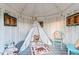 Playhouse interior featuring teepee, toys, and a wooden floor creating a fun space for children at 5090 S Perry Park, Sedalia, CO 80135