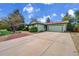 Charming single-Gathering home with a large driveway and colorful landscaping at 1669 S Uvalda St, Aurora, CO 80012