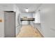 Bright kitchen featuring stainless steel appliances and ample countertop space at 1669 S Uvalda St, Aurora, CO 80012