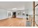 Spacious living room with wood floors, fireplace, and natural light at 1669 S Uvalda St, Aurora, CO 80012