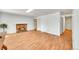 Bright living room with wood floors and brick fireplace at 1669 S Uvalda St, Aurora, CO 80012