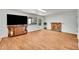 Inviting living area with a cozy fireplace and large windows at 1669 S Uvalda St, Aurora, CO 80012