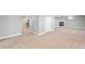 Finished basement with carpet, white doors, and fireplace at 335 N 11Th Ave, Brighton, CO 80601
