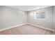 Finished basement with carpet and egress windows at 335 N 11Th Ave, Brighton, CO 80601
