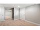 Finished basement with carpet and white doors at 335 N 11Th Ave, Brighton, CO 80601