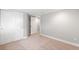 Finished basement with carpet and white doors at 335 N 11Th Ave, Brighton, CO 80601