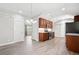 Bright open kitchen featuring stainless appliances, wood cabinets and granite counters at 335 N 11Th Ave, Brighton, CO 80601