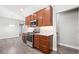 Modern kitchen with stainless steel range and convenient microwave at 335 N 11Th Ave, Brighton, CO 80601