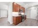 Spacious kitchen with stainless steel appliances and wood-look flooring at 335 N 11Th Ave, Brighton, CO 80601