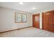 Bedroom with two closets and a window at 16177 E Prentice Pl, Centennial, CO 80015