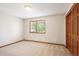 Bedroom with a closet and a window at 16177 E Prentice Pl, Centennial, CO 80015