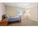 Bedroom with a small window and carpet at 16177 E Prentice Pl, Centennial, CO 80015