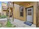 Small, private backyard with patio and landscaping at 800 E 18Th Ave # 105, Denver, CO 80218