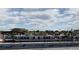 Train at station with an overhead view and surrounding buildings on a bright day at 63 S Sable Blvd # 16, Aurora, CO 80012