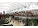 Interior view of bright airport terminal with shops and seating at 63 S Sable Blvd # 16, Aurora, CO 80012