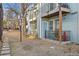 Private patio with red chair and small table at 63 S Sable Blvd # 16, Aurora, CO 80012