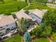 Aerial view showcasing a landscaped backyard, patio, and surrounding neighborhood at 14258 Greenfield Loop, Parker, CO 80134