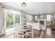 Inviting living area with access to the outdoor patio, seamlessly blending indoor and outdoor living spaces at 14258 Greenfield Loop, Parker, CO 80134