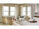 Cozy breakfast nook with comfortable seating and large windows offering natural light at 4237 Ridgewalk Pt, Castle Rock, CO 80108