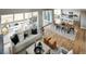 Spacious living room with open floor plan, hardwood floors, and access to a deck at 4237 Ridgewalk Pt, Castle Rock, CO 80108