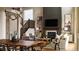 Elegant living room features a fireplace, high ceilings, and ample natural light at 4237 Ridgewalk Pt, Castle Rock, CO 80108