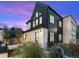 Striking black and white modern home with lush landscaping at 4590 Wolff St, Denver, CO 80212